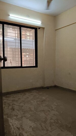 Room in 2 BHK Apartment at Kharghar – for Sale