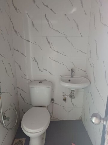 Bathroom in 2 BHK Apartment at Sunrise Glory, Shilphata – for Sale