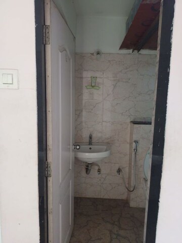 Bathroom in 2 BHK Apartment at Sunrise Glory, Shilphata – for Sale