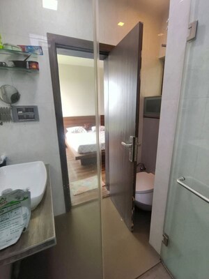 Bathroom in 2.5 BHK Apartment at Oberoi Realty Woods, Goregaon East – for Rent