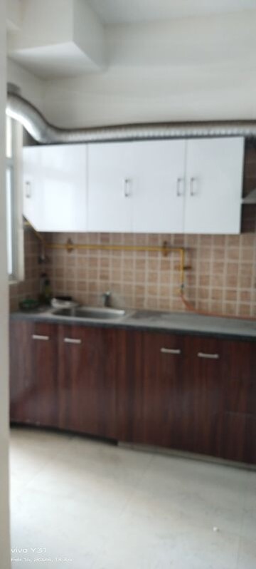 Kitchen in 3 BHK Apartment at Mahagun Mywoods, Sector 16c Greater Noida – for Sale