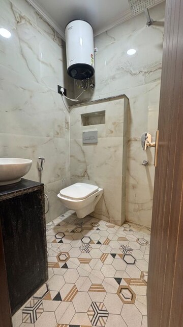 Bathroom in 2 BHK Builder Floor at Palm Residency Chhatarpur, Rajpur Khurd Extension – for Rent