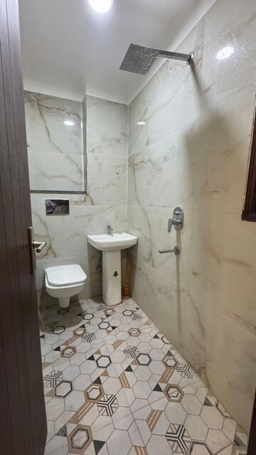 Bathroom in 2 BHK Builder Floor at Palm Residency Chhatarpur, Rajpur Khurd Extension – for Rent