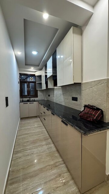 Kitchen in 2 BHK Builder Floor at Palm Residency Chhatarpur, Rajpur Khurd Extension – for Rent