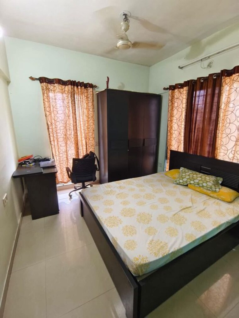 Bedroom, magarpatta-daffodils-apartment 2 Bedroom 980 Sq.Ft. Apartment In Hadapsar Pune 9966107