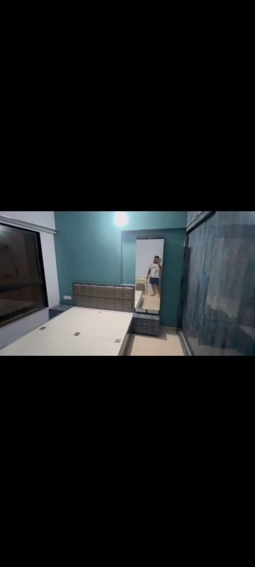 Bedroom in 2 BHK Apartment at Dharamraj CHS, Malad West – for Rent