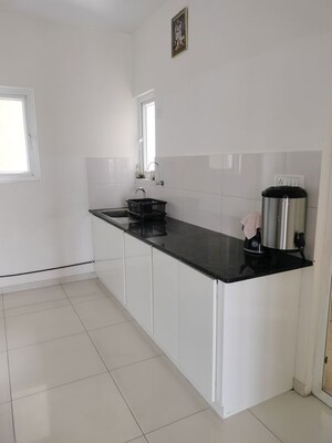 Kitchen in 3 BHK Apartment at Godrej Aqua, International Airport Road – for Rent