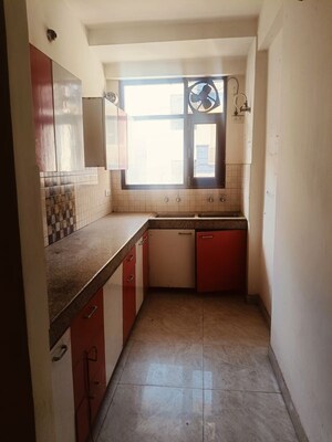 Kitchen in 3 BHK Builder Floor at Guru Nanak Enclave, Dhakoli – for Sale