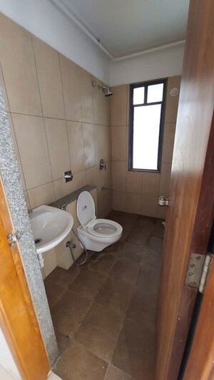 Bathroom in 2 BHK Apartment at Pride Manhattan, Charholi Budruk – for Rent