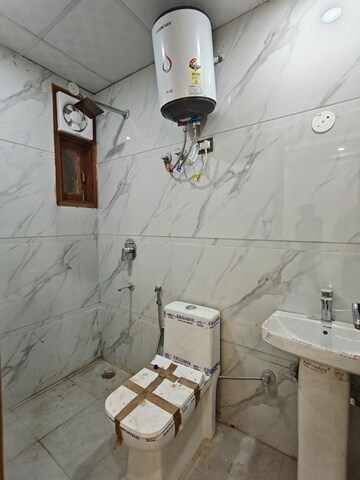 Bathroom in 2 BHK Builder Floor at Rajpur – for Sale