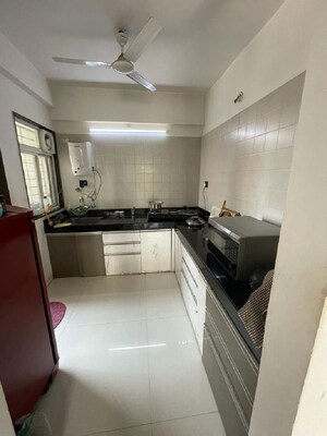 Kitchen in 2 BHK Apartment at Krishna Aeropolis, Lohgaon – for Rent