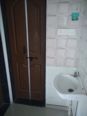 Bathroom in 2 BHK Apartment at Vaman Ganesh Complex, Bavdhan – for Rent