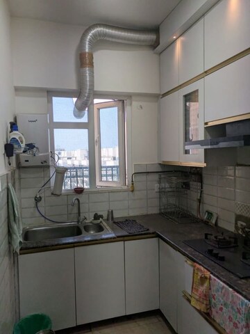 Kitchen in 2 BHK Apartment at Gaur City 2 - 14th Avenue, Sector 16c Greater Noida – for Rent