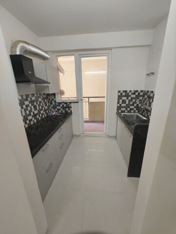 Kitchen in 3 BHK Apartment at Anukampa Sky Lounges, Mansarovar – for Rent