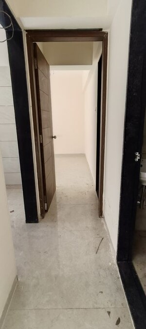 Building Lobby in 1 BHK Apartment at Bindra Complex, Andheri East – for Rent
