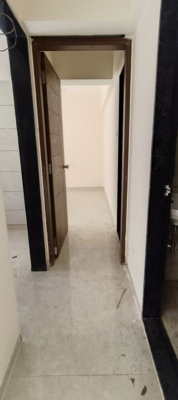 Building Lobby in 1 BHK Apartment at Bindra Complex, Andheri East – for Rent