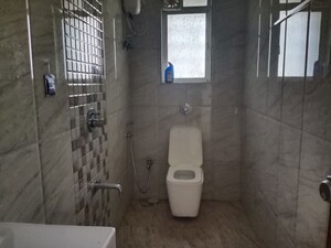 Bathroom in 2.5 BHK Apartment at DLH Orchid, Andheri West – for Rent