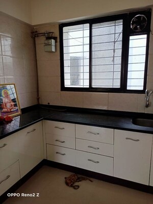 Kitchen in 2 BHK Apartment at Shree Anand Royal Court, Thergaon – for Sale