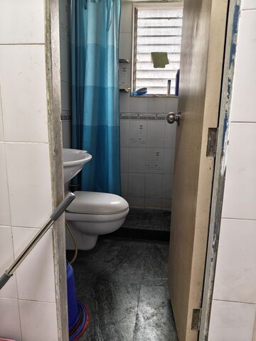 Bathroom in 1 BHK Apartment at Yashovardhan Society, Mahim – for Rent