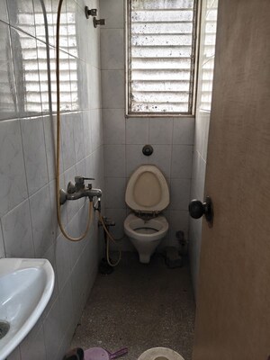 Bathroom in 1 BHK Apartment at Yashovardhan Society, Mahim – for Rent