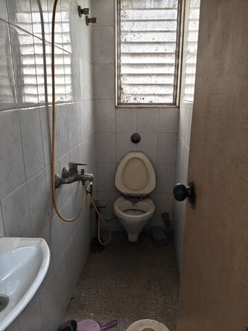 Bathroom in 1 BHK Apartment at Yashovardhan Society, Mahim – for Rent