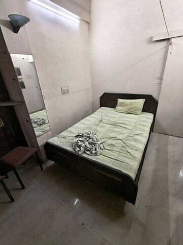 Bedroom in 1 BHK Apartment at Yashovardhan Society, Mahim – for Rent