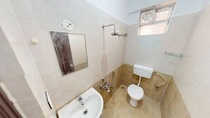 Bathroom in 2 BHK Apartment at ARS Green Villae Rosaceae, Sompura – for Sale
