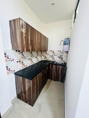 Kitchen in 1.5 BHK Builder Floor at Minarch Tower, Sector 44 – for Rent