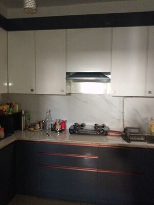 Kitchen in 2 BHK Apartment at Mahagun Mywoods III, Sector 16c Greater Noida – for Rent