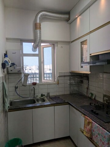 Kitchen in 2 BHK Apartment at Gaur City-2, Gaur City 2 – for Rent