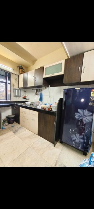 Kitchen in 2 BHK Apartment at Acme Enclave, Malad West – for Rent