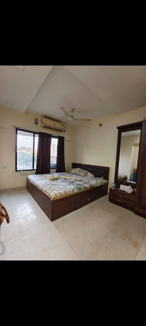 Bedroom in 2 BHK Apartment at Acme Enclave, Malad West – for Rent