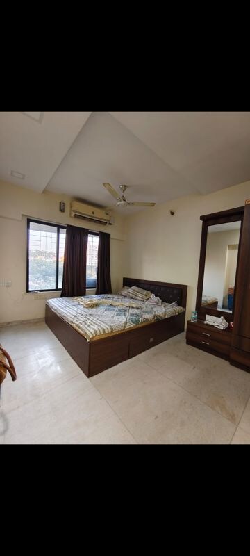 Bedroom in 2 BHK Apartment at Acme Enclave, Malad West – for Rent