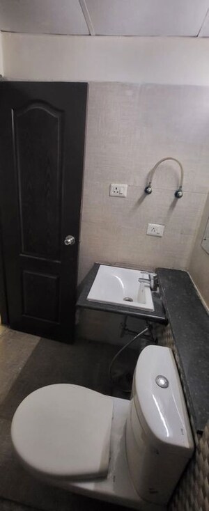 Bathroom in 1 BHK Apartment at Shri Radha Sky Gardens, Sector 16b Greater Noida – for Sale