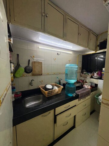 Kitchen in 3 BHK Apartment at Gokuldham Complex, Goregaon East – for Rent
