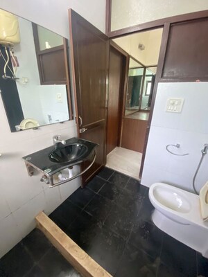 Bathroom in 4 BHK Apartment at Vasant Kunj – for Rent