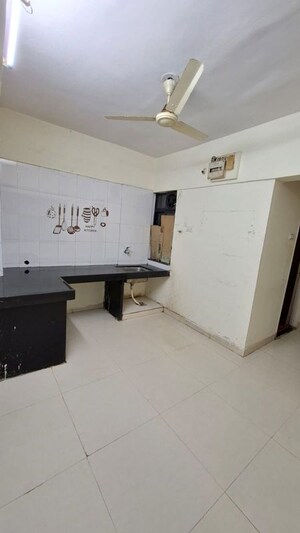 Kitchen in 2 BHK Apartment at Karan Sara Apartment, Baner – for Rent