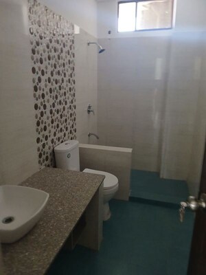 Bathroom in 4 BHK Builder Floor at Prem Nagar – for Rent