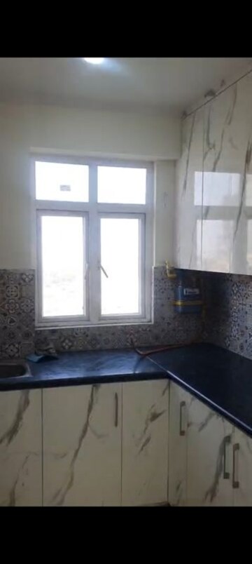 Kitchen in 3 BHK Apartment at Rise Organic Homes, Mahurali – for Rent