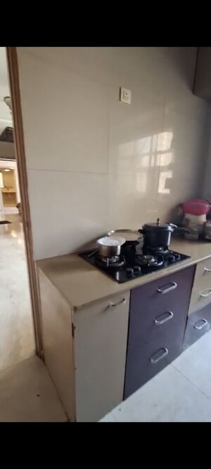 Kitchen in 2 BHK Apartment at Hiranandani Estate Rodas Enclave, Ghodbunder Road – for Sale