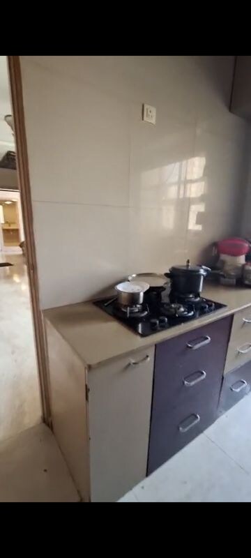 Kitchen in 2 BHK Apartment at Hiranandani Estate Rodas Enclave, Ghodbunder Road – for Sale