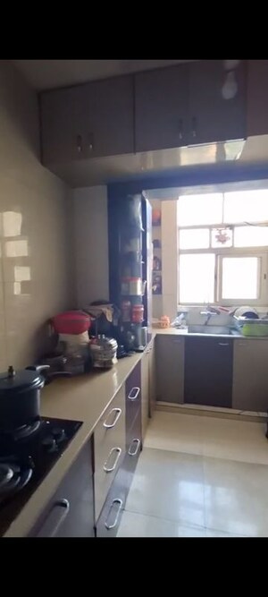 Kitchen in 2 BHK Apartment at Hiranandani Estate Rodas Enclave, Ghodbunder Road – for Sale