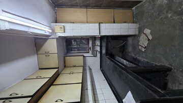 Kitchen in 1 BHK Apartment at Siddhivinayak Tower Runwal Nagar, Kolbad – for Rent