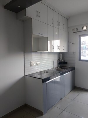 Kitchen in 3 BHK Apartment at Gulshan Bellina, Sector 16 Greater Noida – for Rent