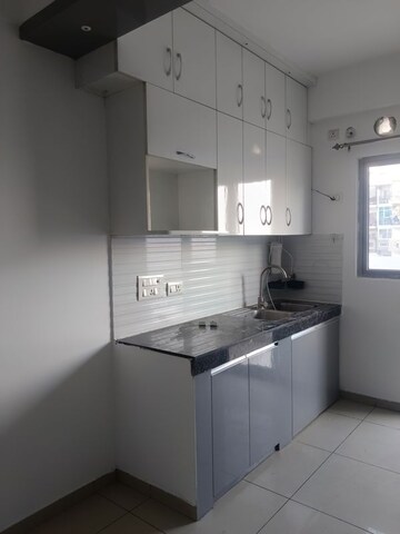 Kitchen in 3 BHK Apartment at Gulshan Bellina, Sector 16 Greater Noida – for Rent