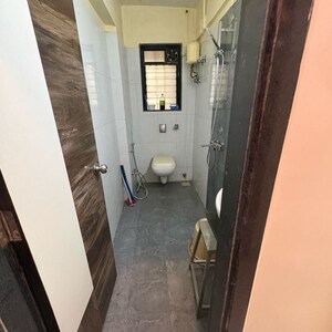 Building Lobby in 1 BHK Apartment at New Suresh Apartment, Tilak Nagar – for Rent