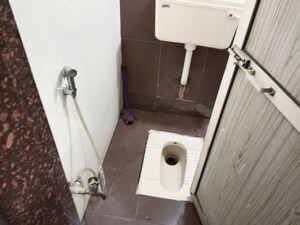 Bathroom in 2 BHK Apartment at Pratik Shree Sharnam CHS, Mira Road East – for Rent