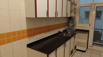 Kitchen in 2 BHK Builder Floor at Risland Sky Mansion, Chattarpur – for Rent