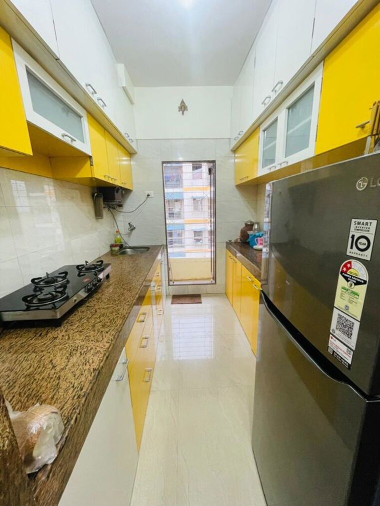 Kitchen, arkade-art 2 Bedroom 925 Sq.Ft. Apartment In Mira Road Thane 9969491