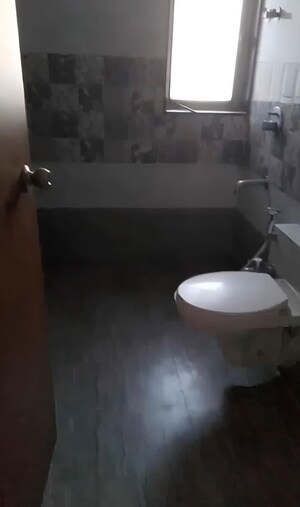 Bathroom in 3 BHK Apartment at Navghar Road – for Rent